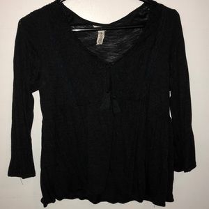 black blouse lace detailing with tassels